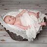 baby in basket with butterfly shawl 