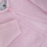 Pink cashmere baby cardigan folded
