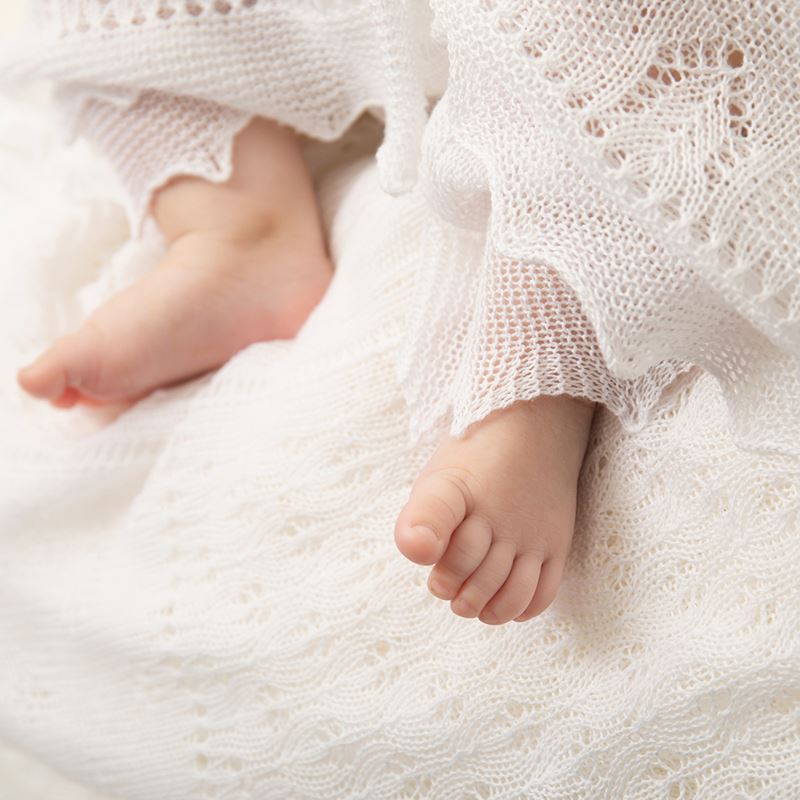 baby feet sticking out of White Patchwork