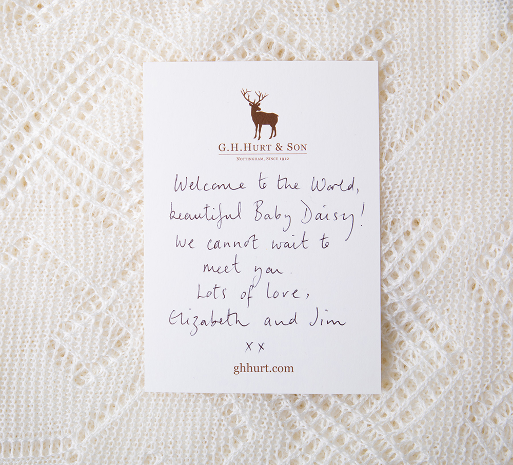 Hand written gift card with baby shawl